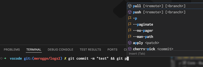 git commit と git push を含む複数コマンド行と、サジェストウィジェットのスクリーンショット